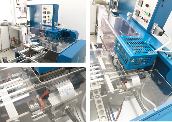 Machine for cutting and folding fabric labels