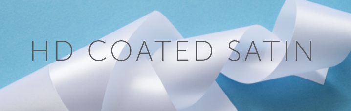 WE HAVE ADDED A NEW TYPE OF SATIN TO OUR RANGE OF MATERIALS FOR PRINTED FABRIC LABELS