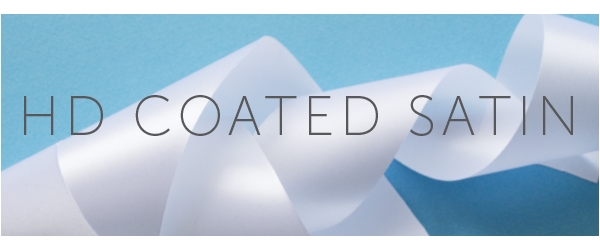 WE HAVE ADDED A NEW TYPE OF SATIN TO OUR RANGE OF MATERIALS FOR PRINTED FABRIC LABELS