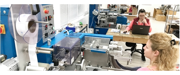 Our new equipment for cutting and folding of custom printed fabric labels